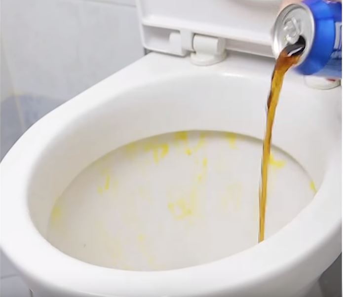Unusual cleaning hacks - cleaning toilet with cola