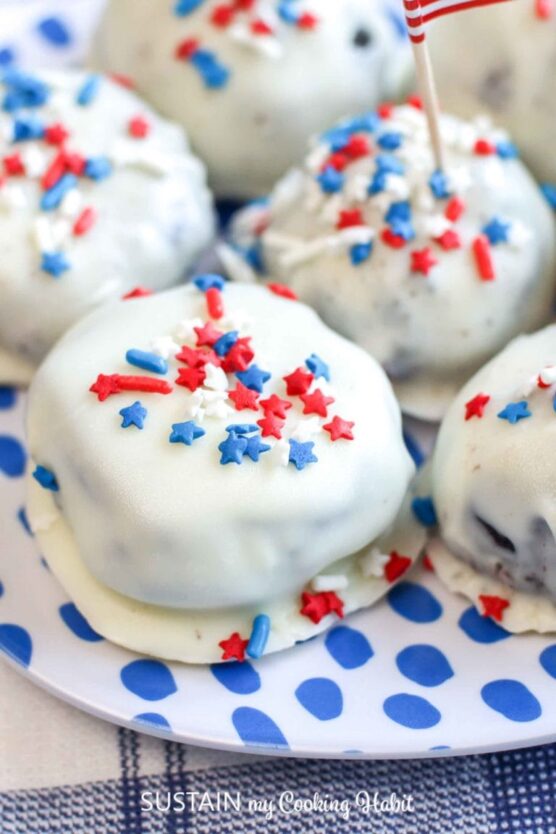 Truffles coated in white chocolate decorated with sprinkles