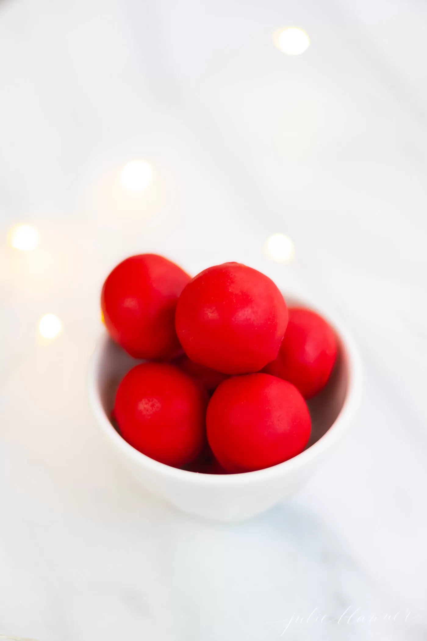 Rudolph nose dough balls in a bowl