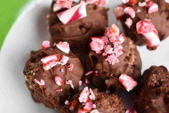 No-bake choc peppermint balls topped with crushed candy cane