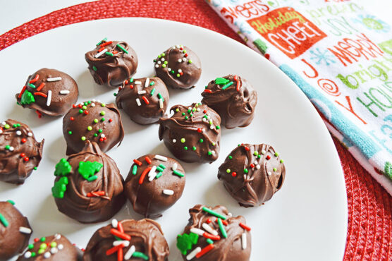 Chocolate cookie truffles with colorful sprinkles on top