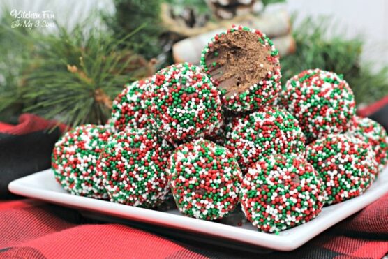 Boozy Christmas chocolate truffles coated with red, green, and white sprinkles