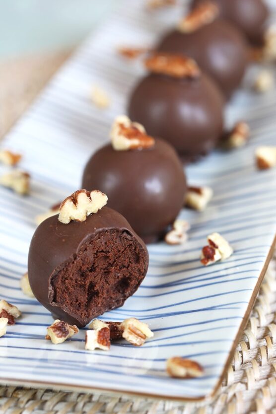 Bourbon dark chocolate truffles topped with pecans