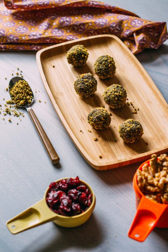 Date-sweetened chocolate pistachio bites coated with finely ground pistachios 