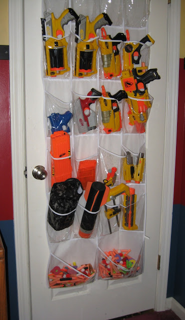 nerf guns stored in shoe rack