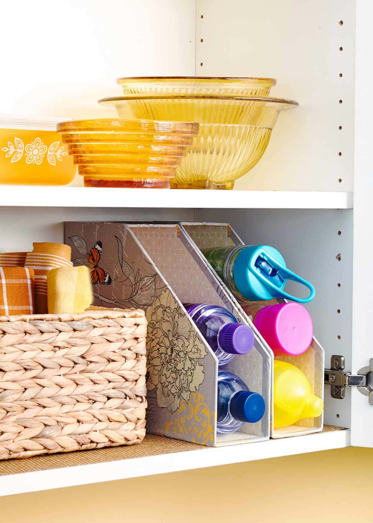 Use magazine files for water bottles - 31 Pantry organisation ideas