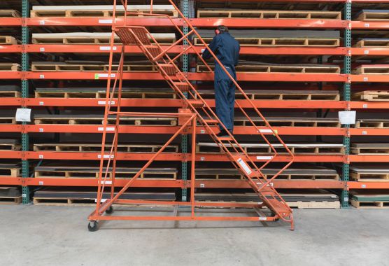 Portable Warehouse Ladder being used in the warehouse