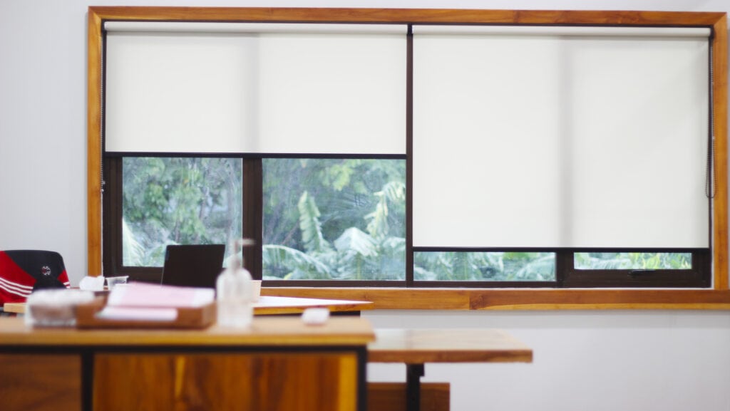 Roller blinds with minimalist design are perfect for a home office or any modern interior.